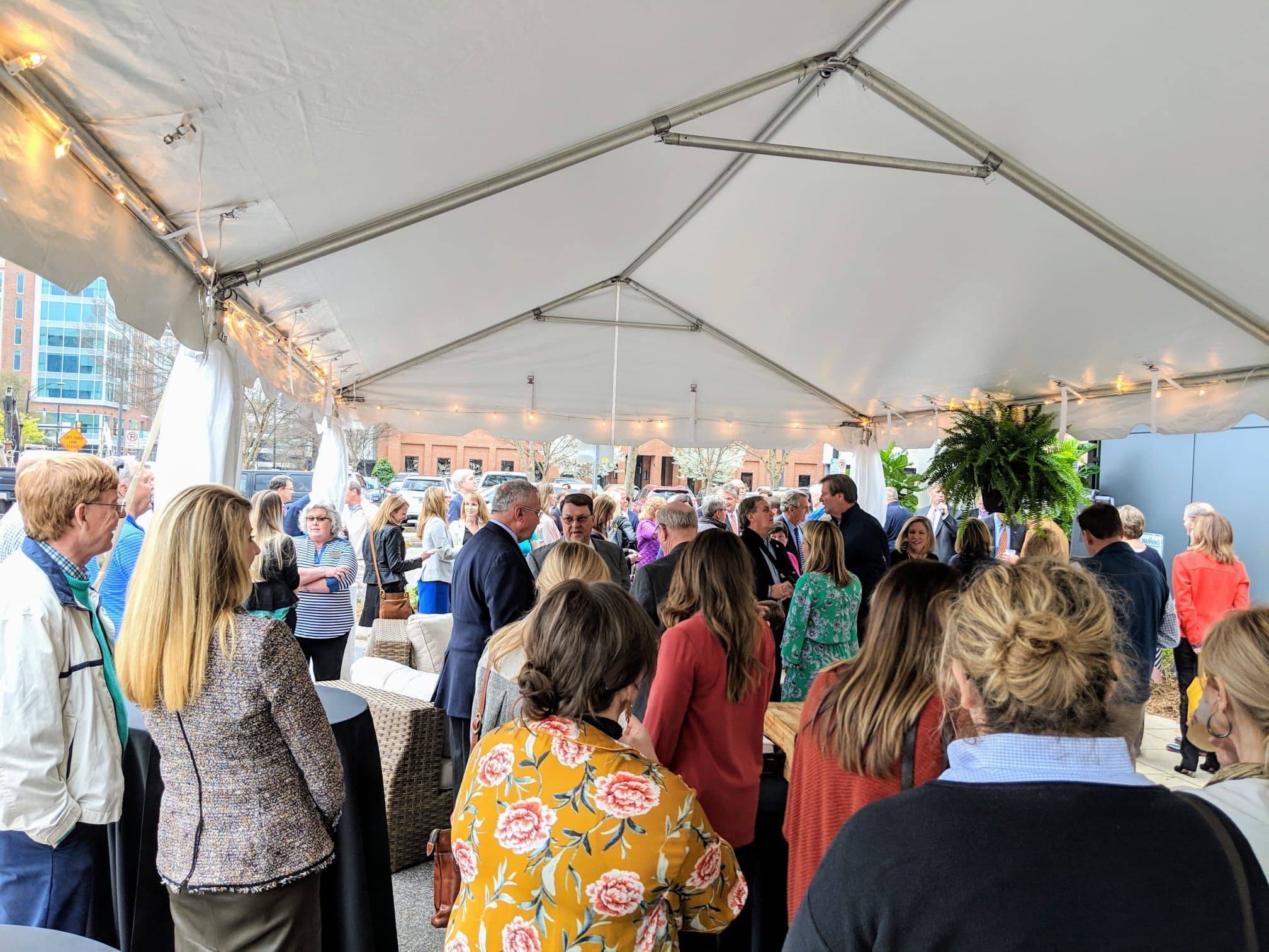 DTG Ribbon Cutting Crowd Exterior