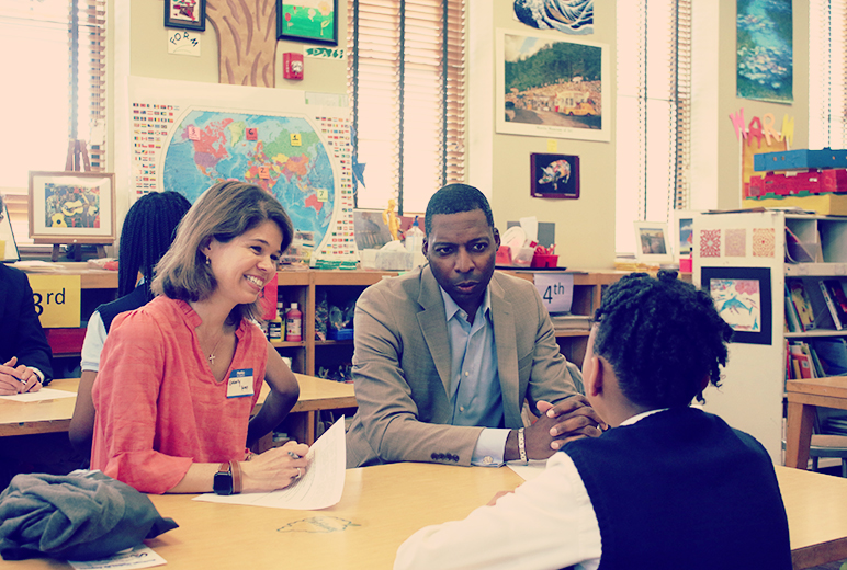 Commercial banker,  James Heffner, talking to a student at Heritage Academy in Augusta.